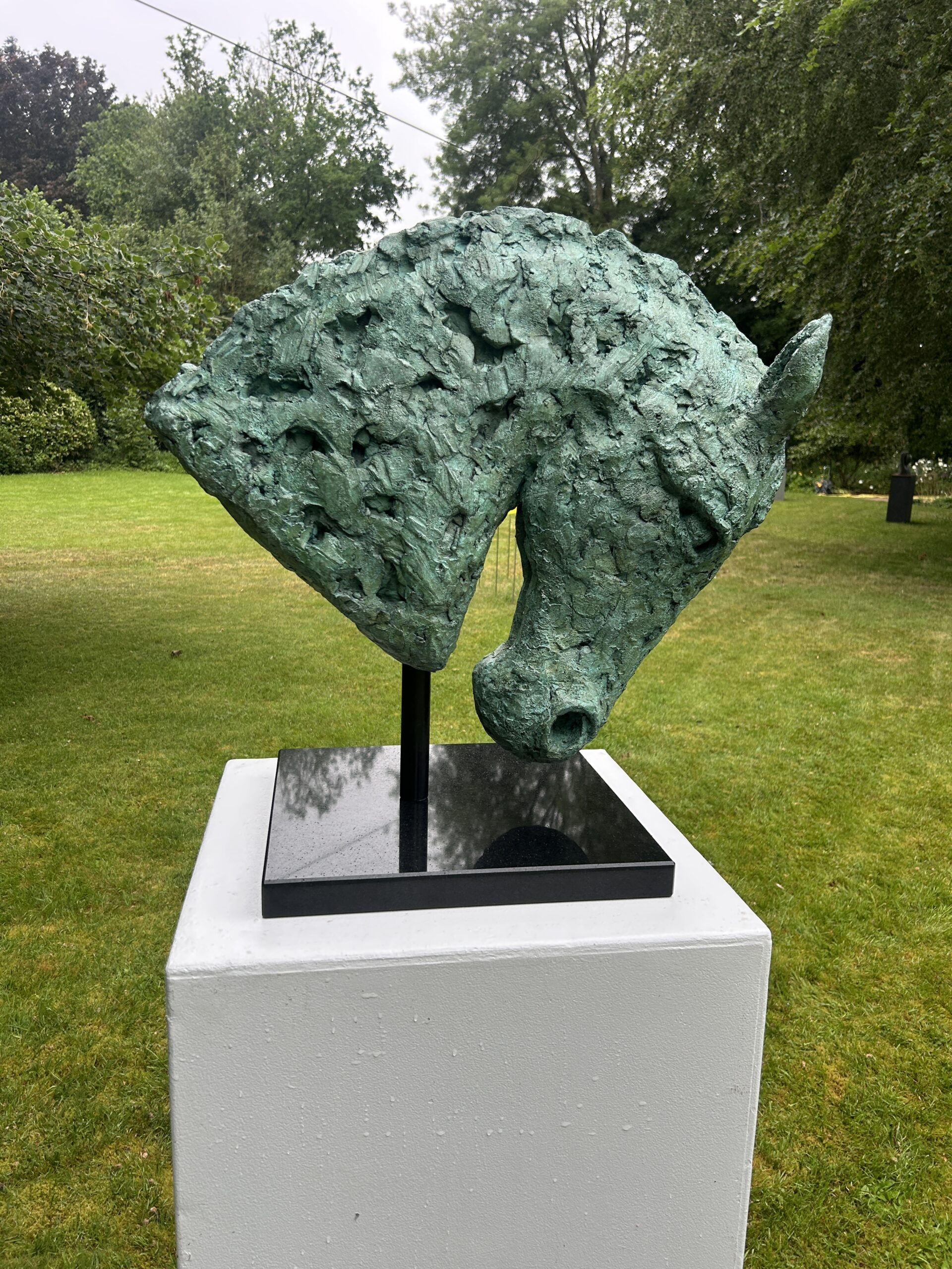 Hero — cold cast bronze horse head mounted on black granite